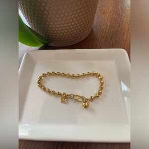 Gold color bracelet 8” long including clasp.